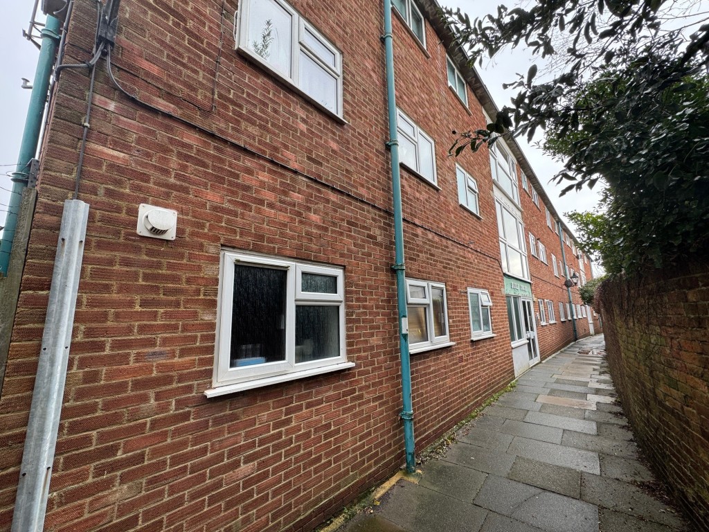 Lot: 147 - TWO-BEDROOM APARTMENT WITH SEA VIEWS - Bayle Court footpath elevation